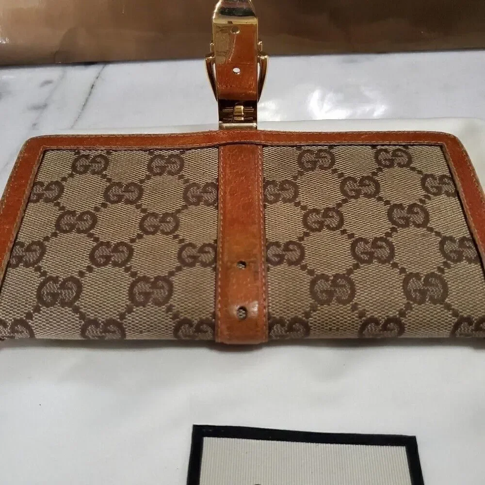 Gucci GG Logo Continental Canvas Tan Bifold Wallet with Leather Trim. 1462012778